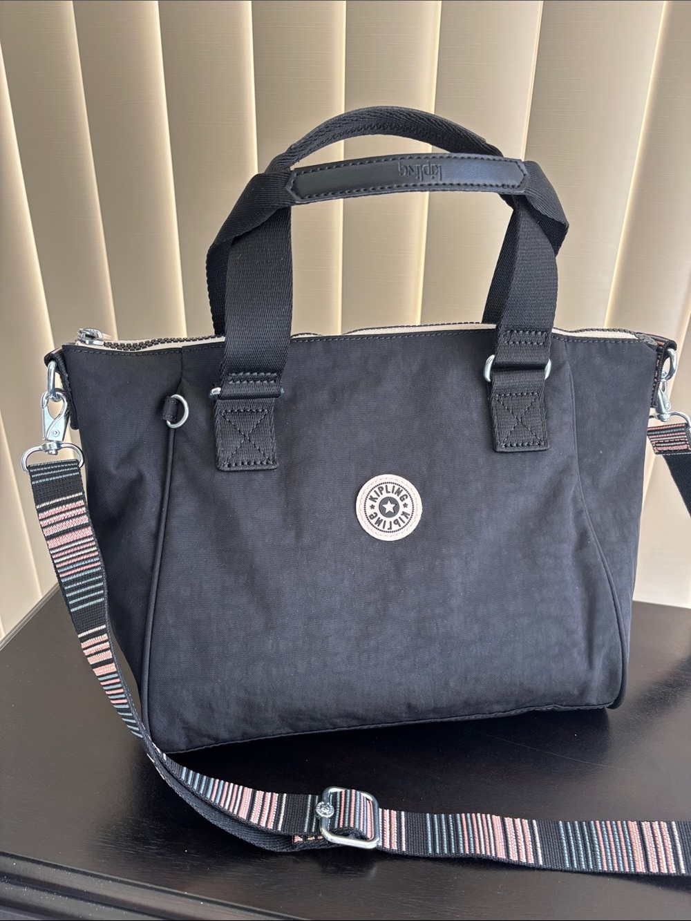 Kipling Black Satchel Bag with unique strap design Like New